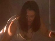 Nude appearance of Natalie Canerday in South of Heaven, West of Hell (2000)...
